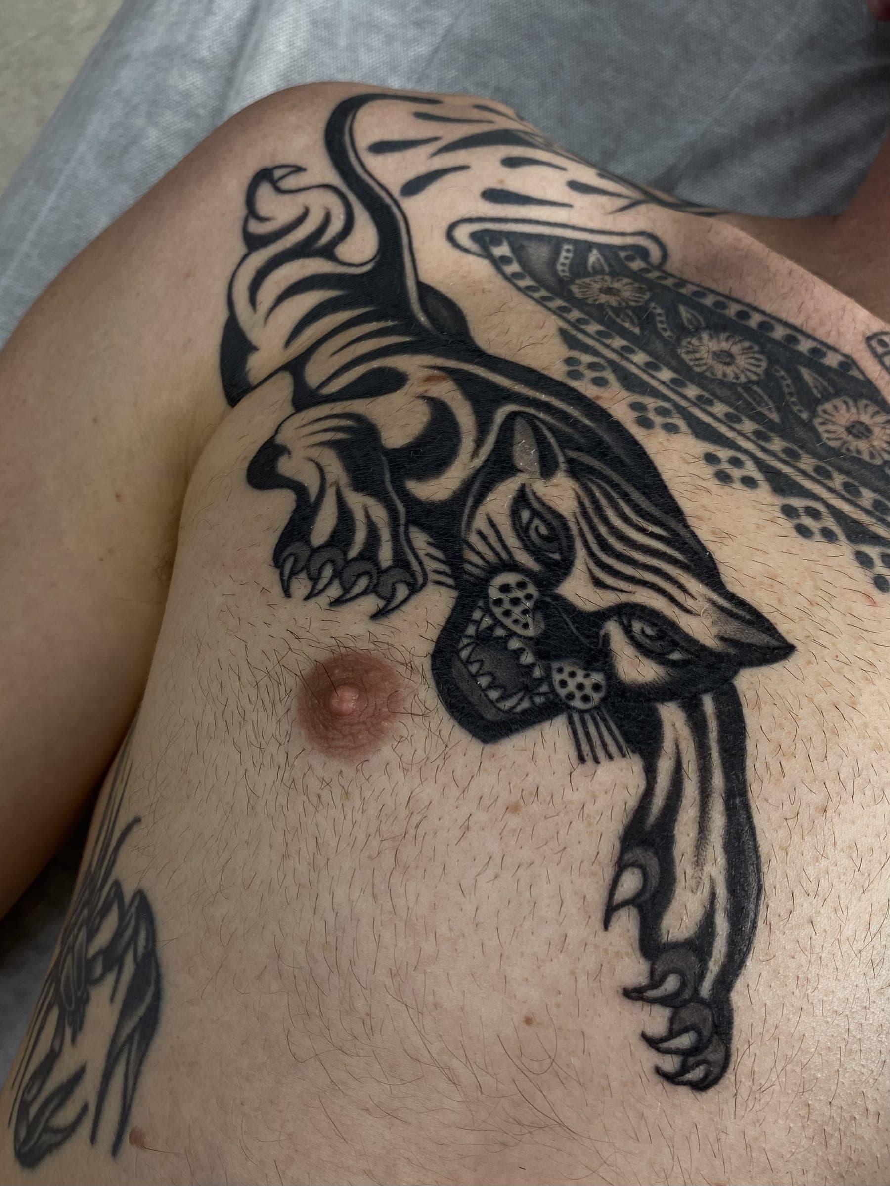 Black traditional crawling panther tattoo
